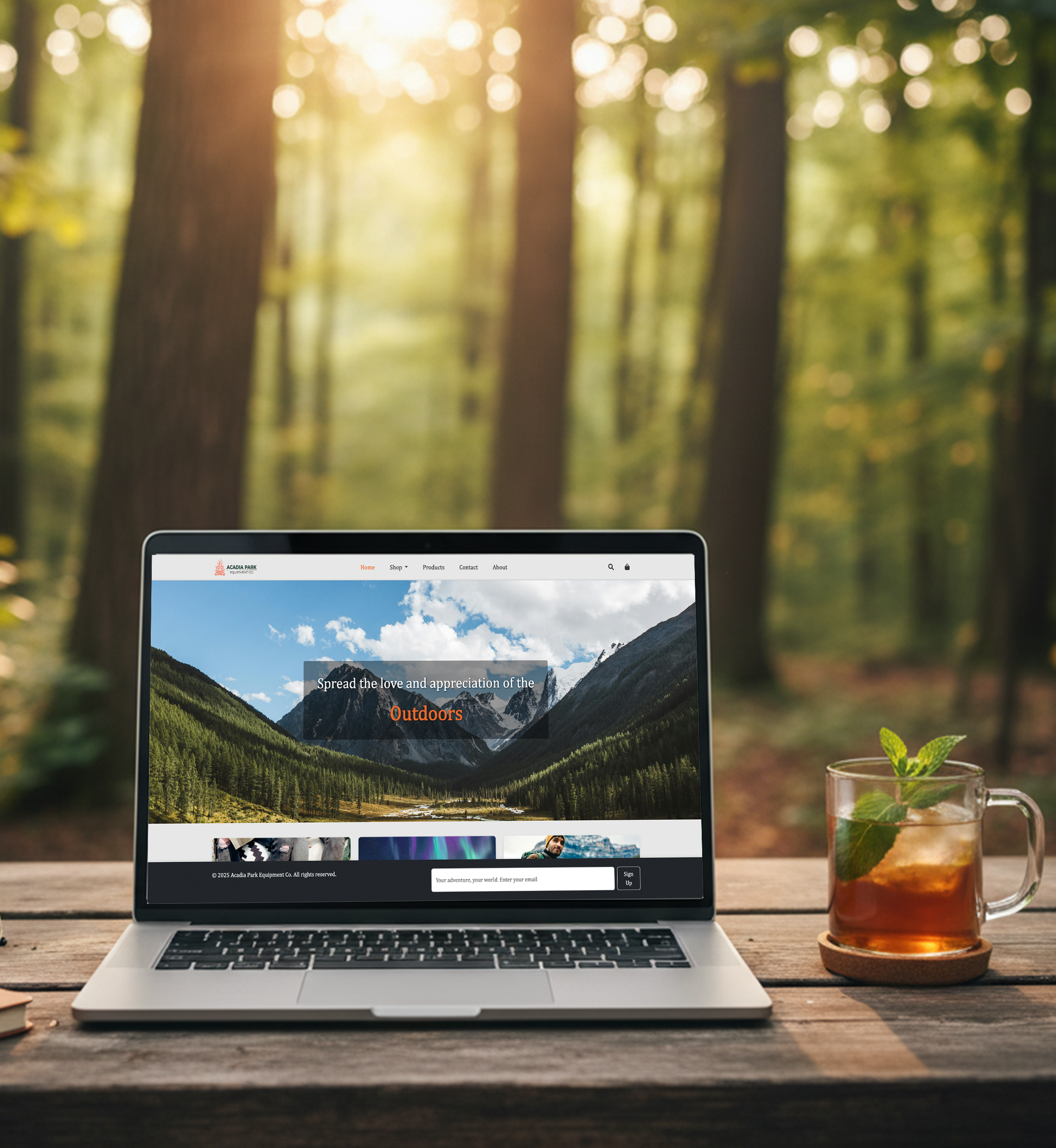 E-commerce desktop website mockup on a laptop in a forest setting.
